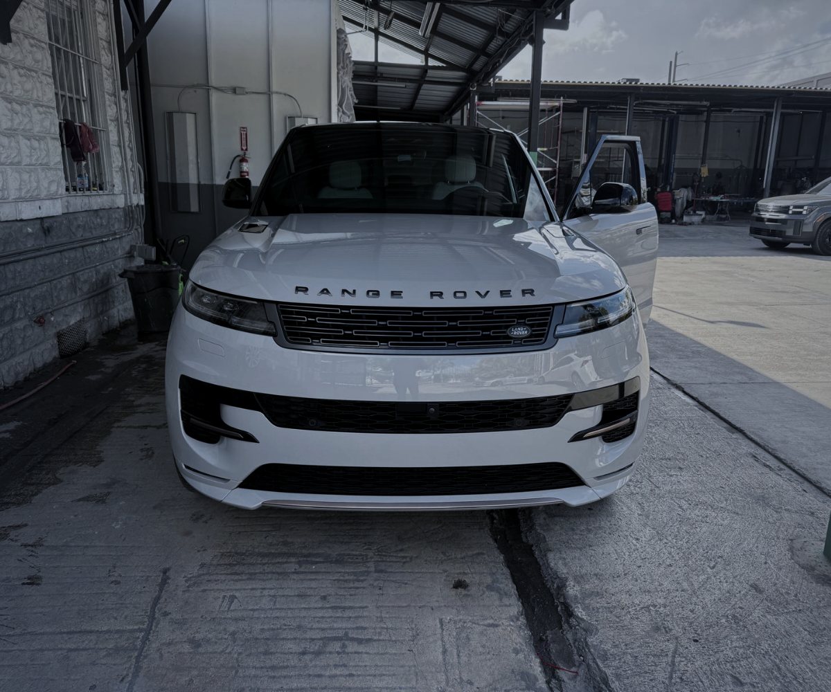 White Range Rover Sport at the LEY Auto Collision shop